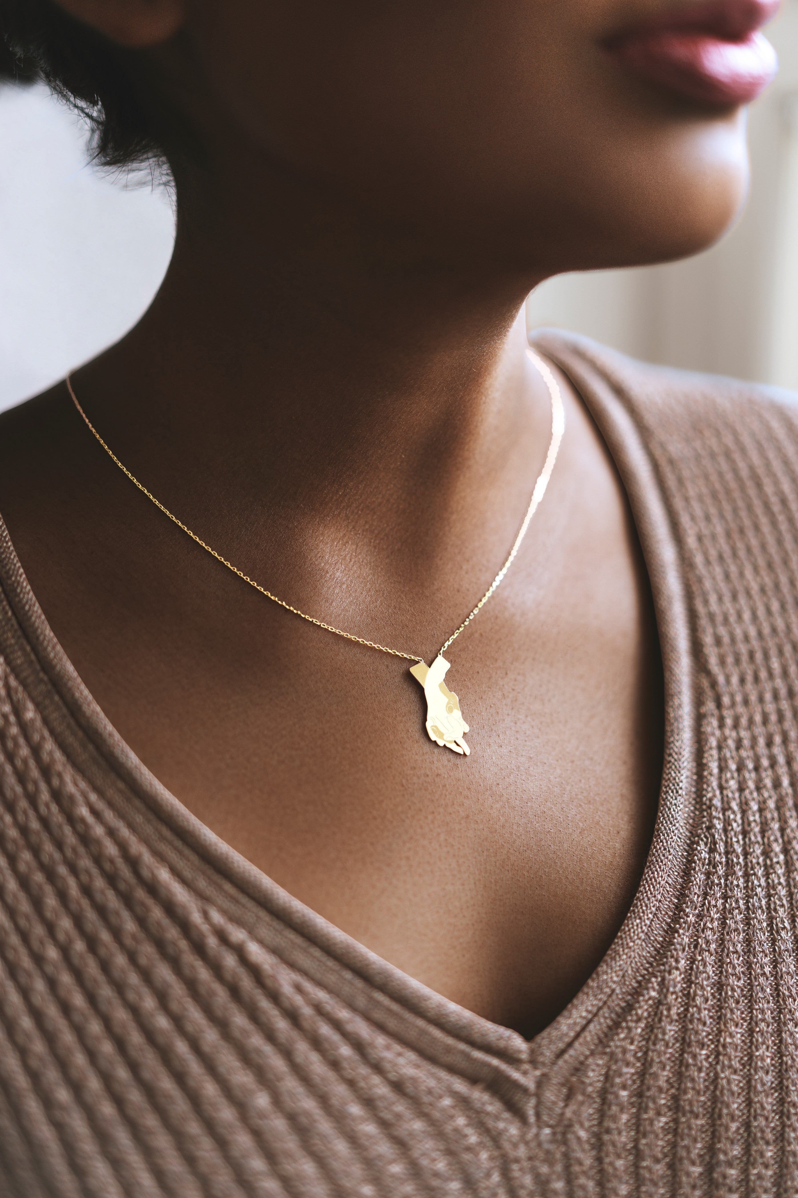 Holding Hands Pendant Necklace